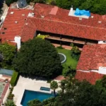 Luxury exterior view of the Angelina Jolie House featuring elegant modern architecture, premium landscaping, and a sophisticated mansion design.