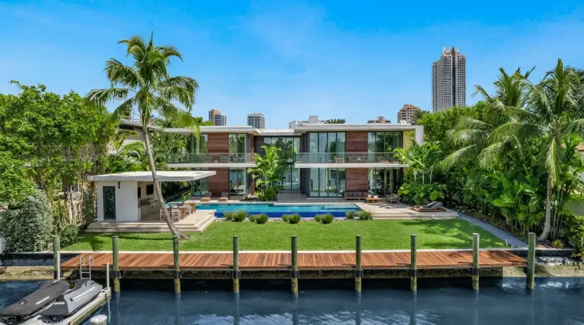 Interior of the Lil Wayne mansion featuring glass walls and luxury modern design