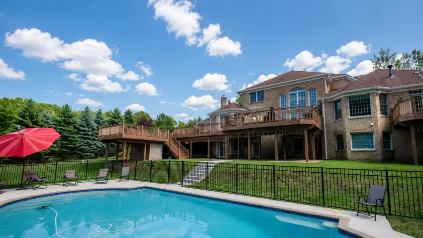 Luxury exterior view of the Lamar Jackson House in Florida featuring modern architecture, elegant landscaping, and premium design.