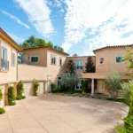 Nicki Minaj house featuring a stunning luxury mansion exterior, elegant architecture, and sophisticated estate landscaping.