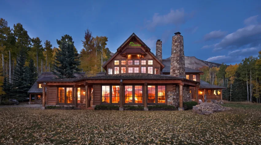 Tom Cruise Telluride ranch in Colorado surrounded by forest and mountain landscape
